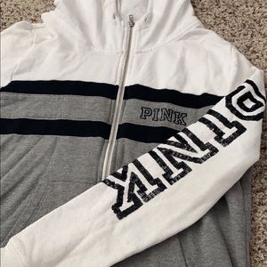 grey and white PINK jacket with black sequence.